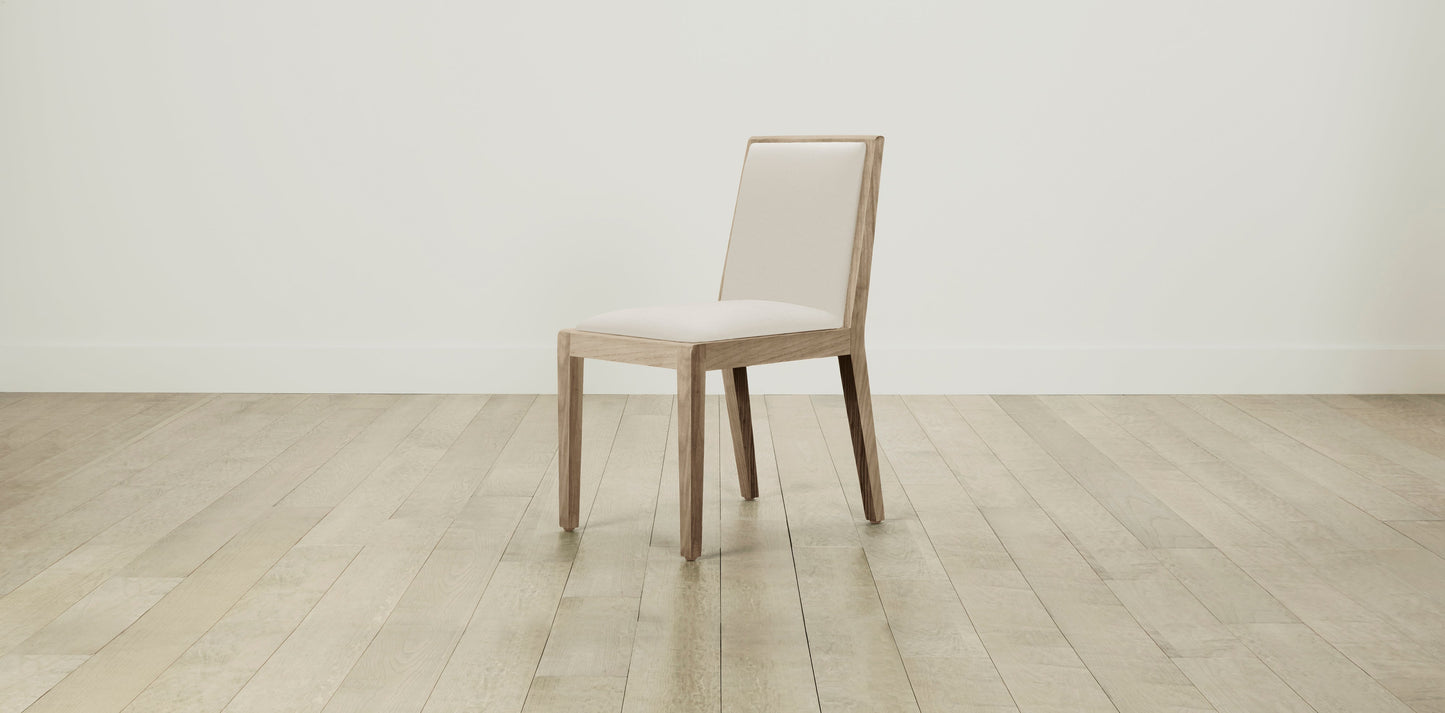 The Madison  - Pebbled Leather Swan Dining Chair