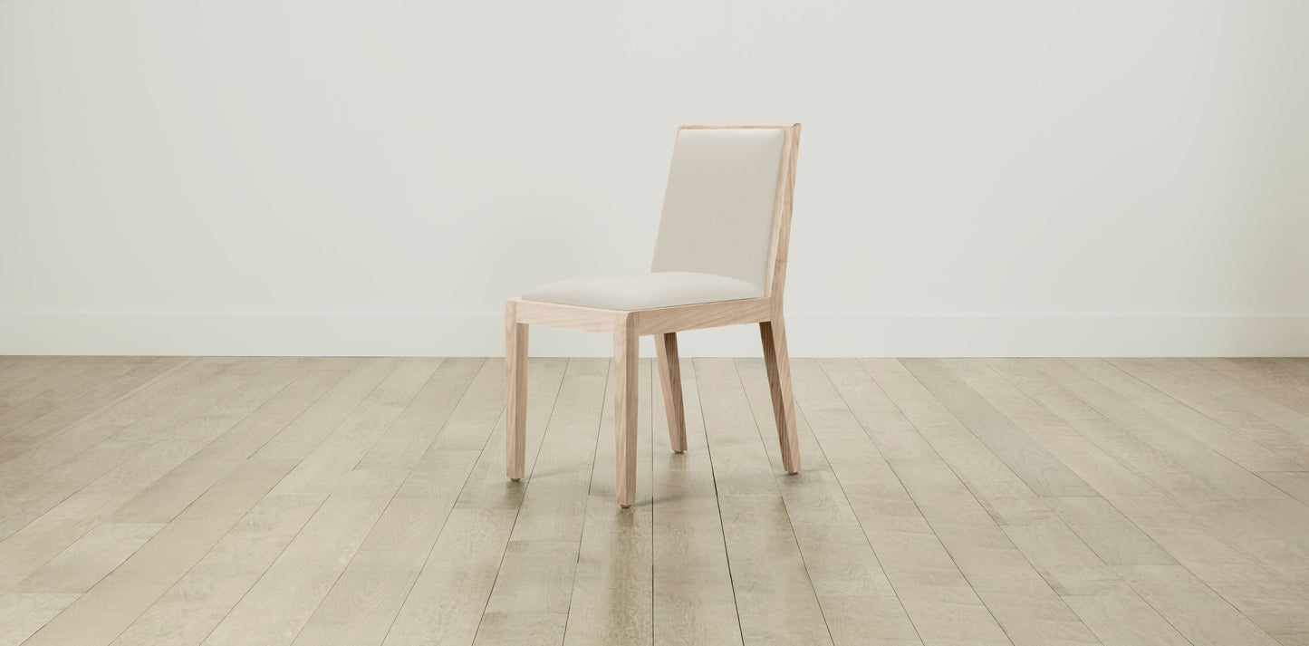 The Madison  - Pebbled Leather Swan Dining Chair